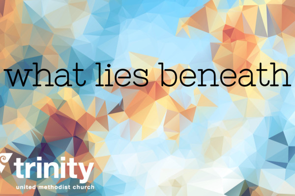Image of sky with words "what lies beneath"